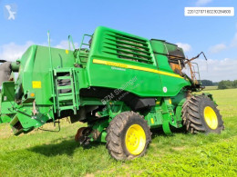 حصاد John Deere T560 HM آلة حصاد ودرس مستعمل