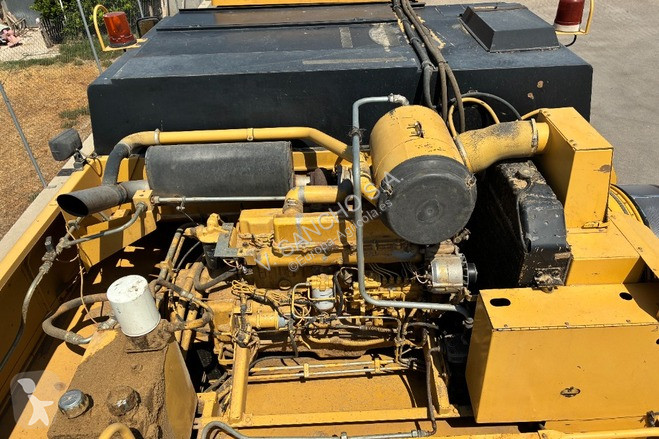 Oogst New Holland TC 56