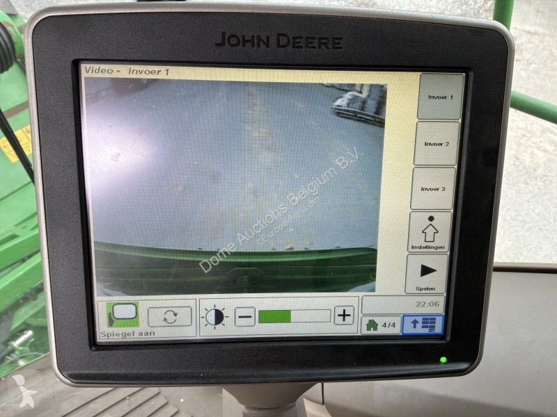 Žně John Deere T560i