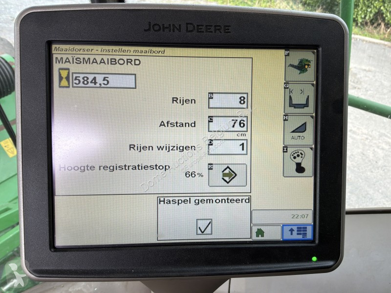 Žně John Deere T560i