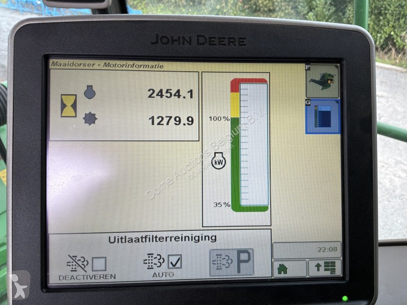 Žně John Deere T560i