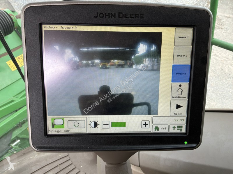 Žně John Deere T560i