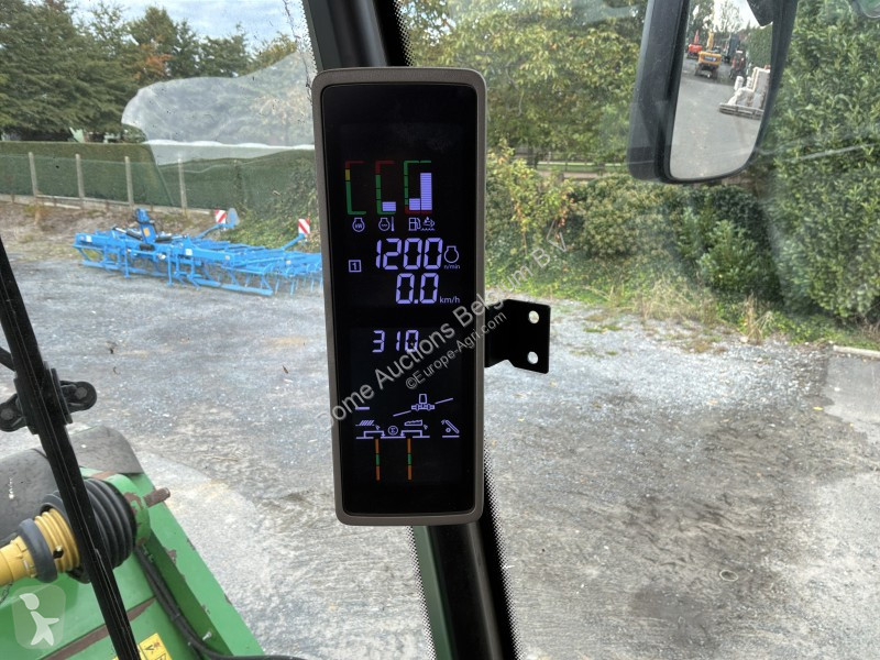 Žně John Deere T560i
