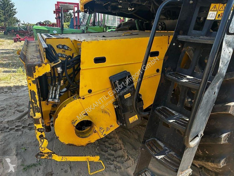 Skörd New Holland  CR 9070 Elevator