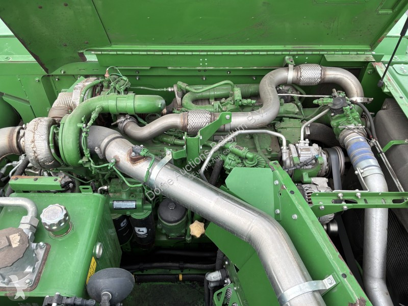 Žně John Deere T560i