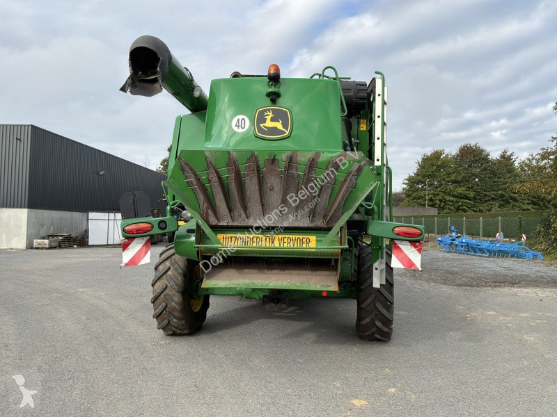 Žně John Deere T560i