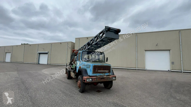 Bore-, hamre-, skæremaskine Bomag Iveco magirus...