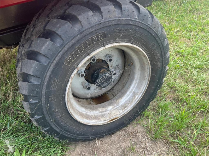 Voederverdeling  Devos voermengwagen met losband