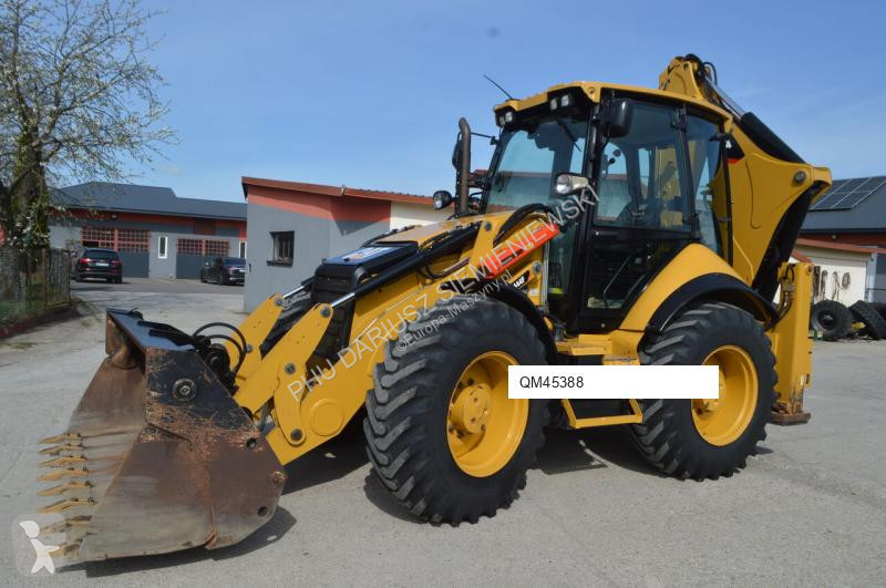 Traktor med grab Caterpillar 444F
