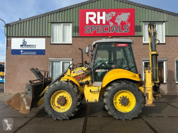 Koparko-ładowarka New Holland LB 115 B , CE, 240 MM MULTI PURPOSE LOADER BUCKET, 800 MM BACHOE DIGGING BUCKET, FLIP OVER FORKS, AIR CONDITIONER