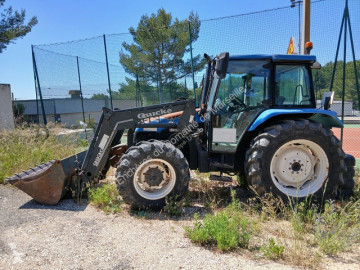 Markológép New Holland Lot réservé aux professionnels.
Tractopelle NEW HOLLAND TL80