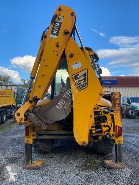 Traktor med grab JCB