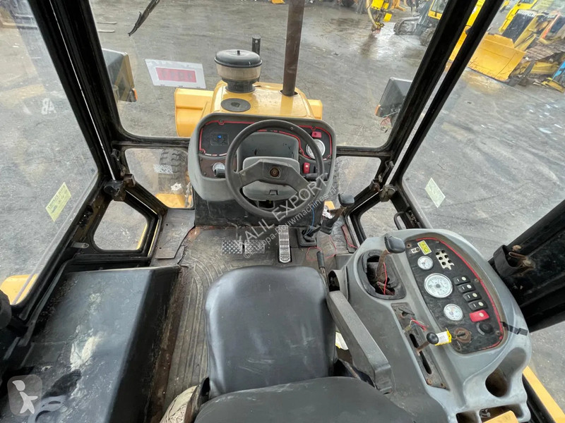 Traktor med grab Caterpillar 424B Backhoe...