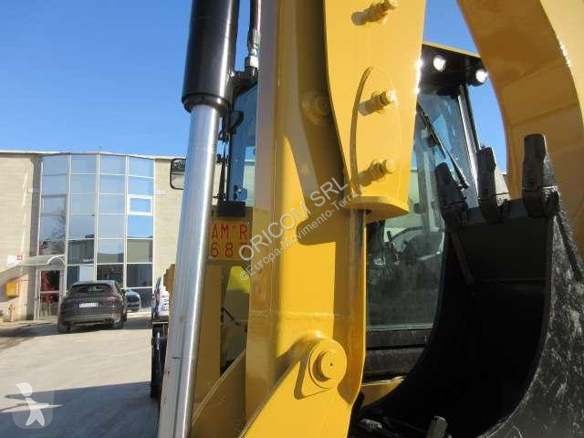 Traktor med grab Caterpillar 432