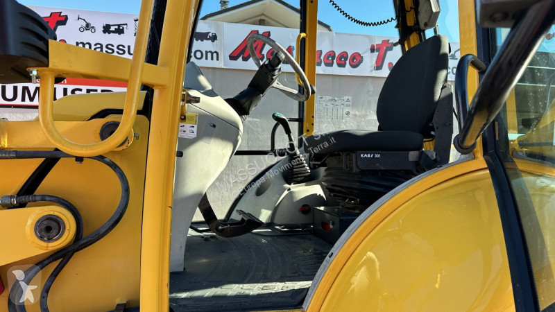 Traktor med grab Komatsu