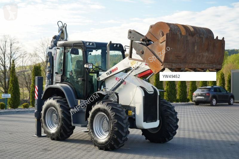 Traktor med grab Terex TLB 990
