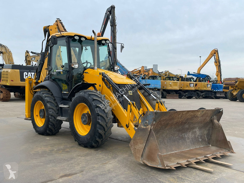 Traktor med grab JCB
