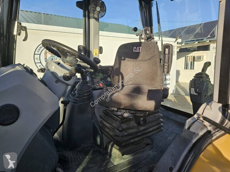 Buldoexcavator Caterpillar