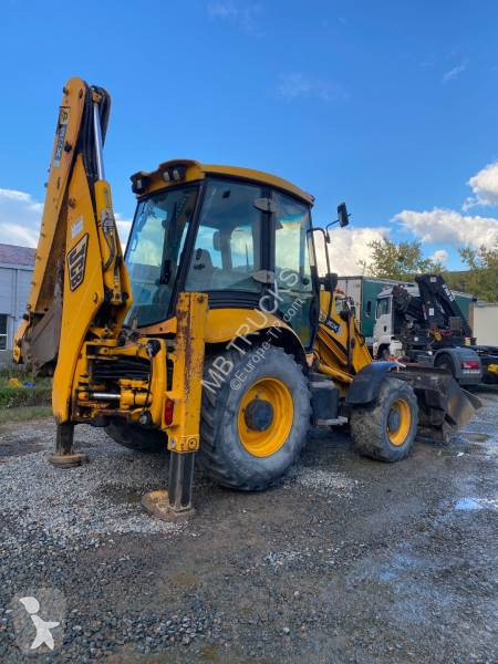 Traktor med grab JCB