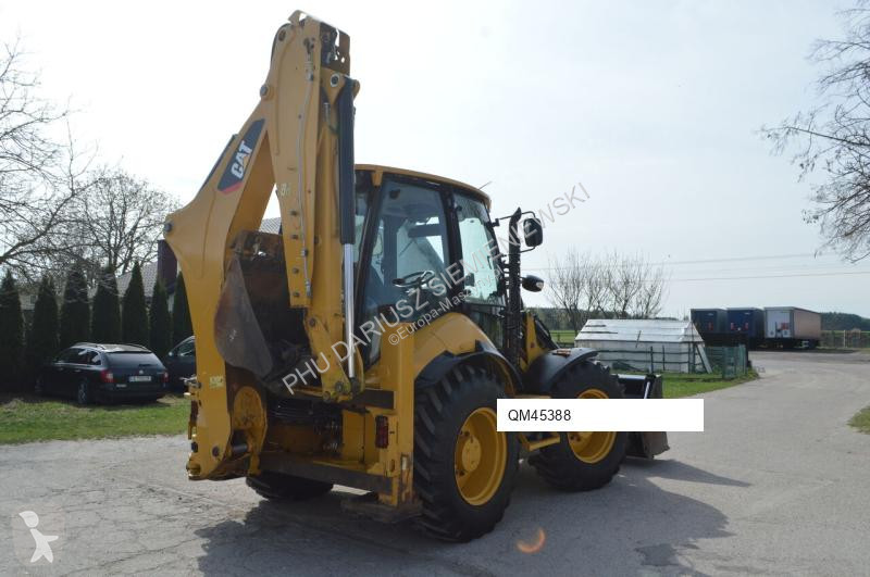 Traktor med grab Caterpillar 444F