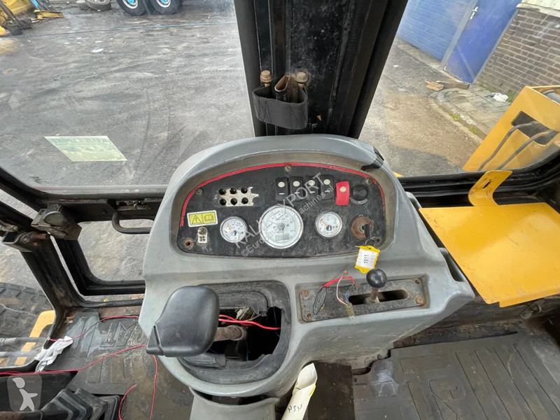 Traktor med grab Caterpillar 424B Backhoe...