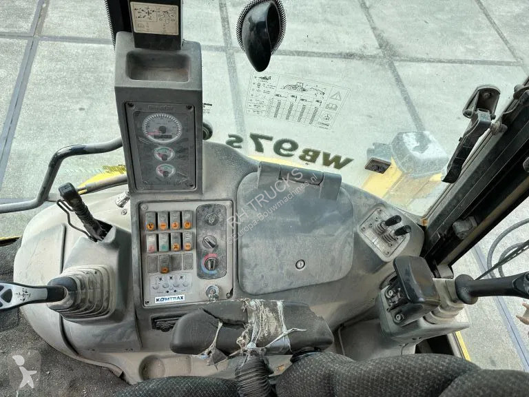 Traktor med grab Komatsu E0