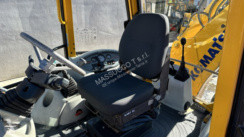 Traktor med grab Komatsu