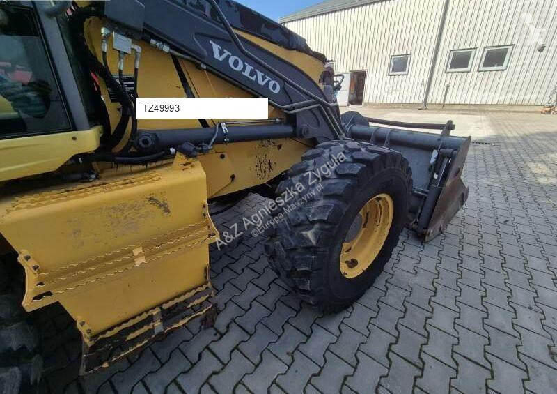 Traktor med grab Volvo