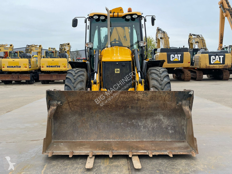 Traktor med grab JCB