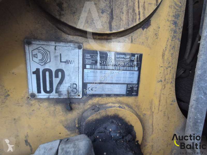 Екскаватор навантажувач Caterpillar