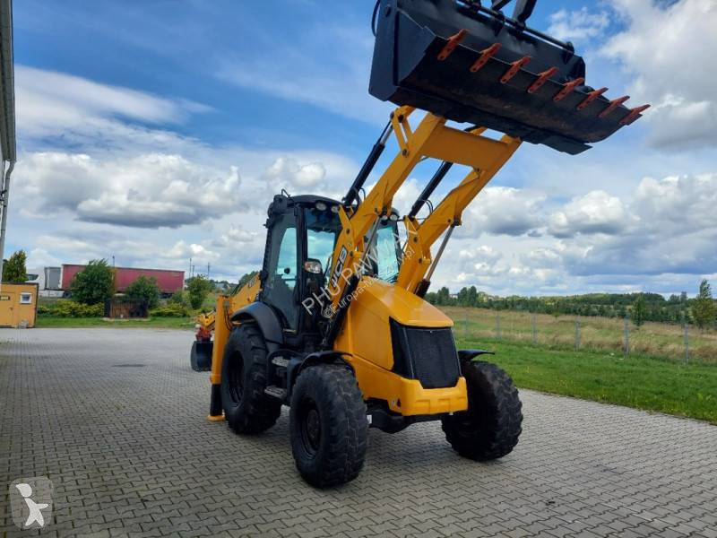 Traktor med grab JCB
