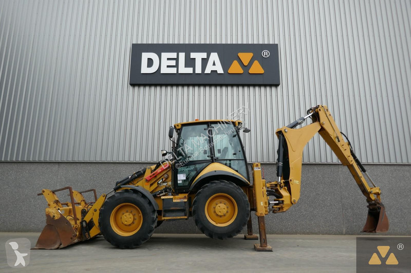 Traktor med grab Caterpillar 444F