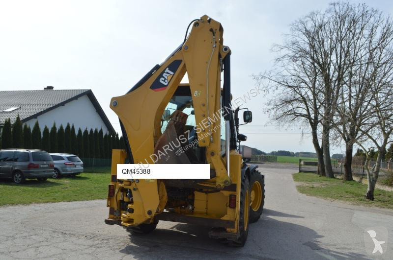 Traktor med grab Caterpillar 444F