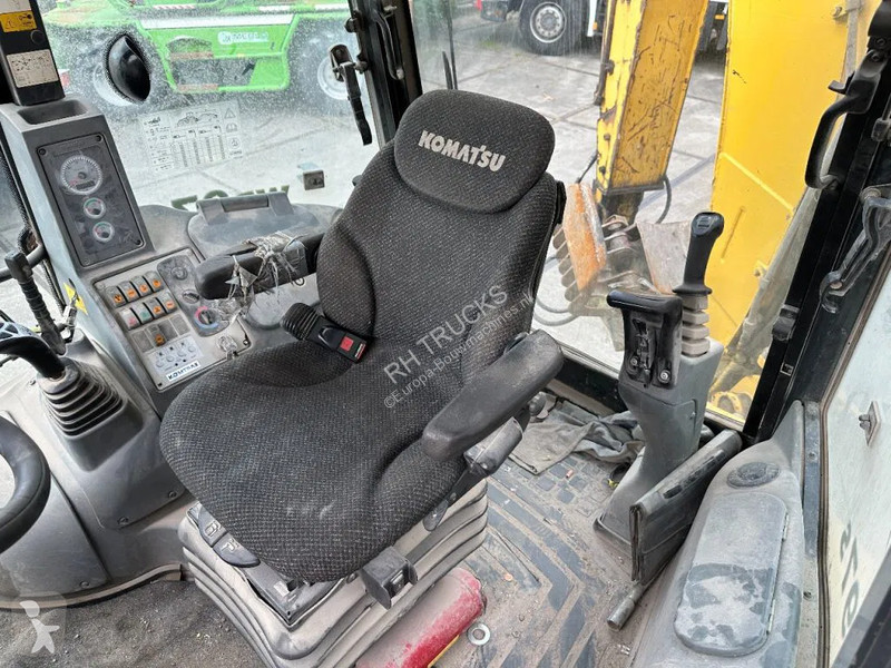 Traktor med grab Komatsu E0