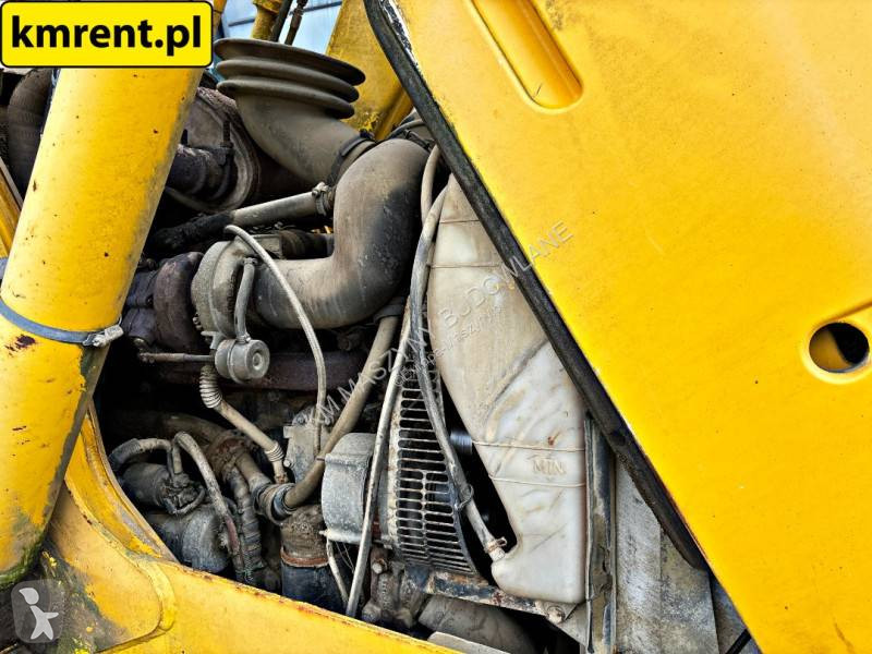 Traktor med grab Komatsu WB 93R-5...