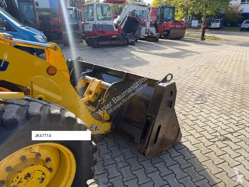 Traktor med grab Komatsu