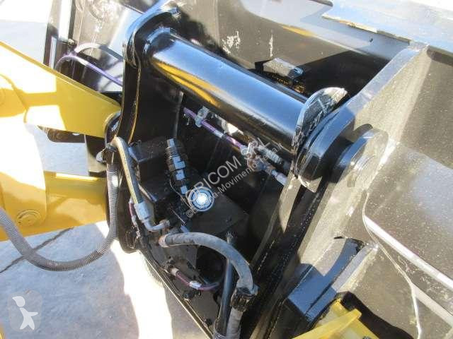 Traktor med grab Caterpillar 432