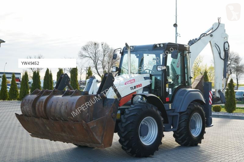 Traktor med grab Terex TLB 990