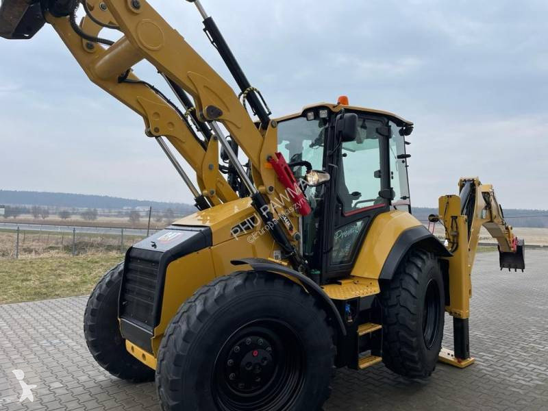 Traktor med grab Caterpillar 444 F2