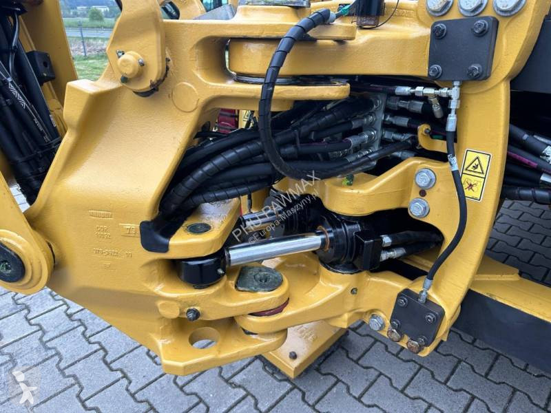 لودر حفار Caterpillar 2