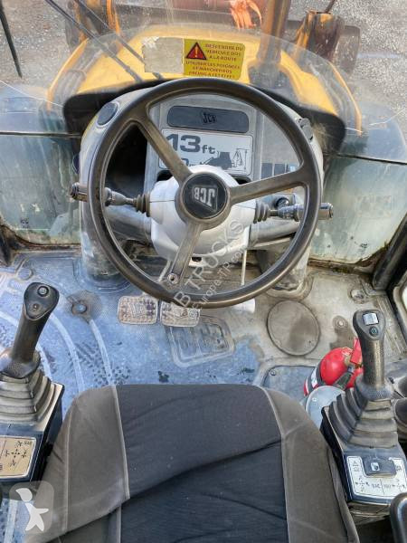Traktor med grab JCB