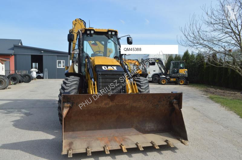 Traktor med grab Caterpillar 444F