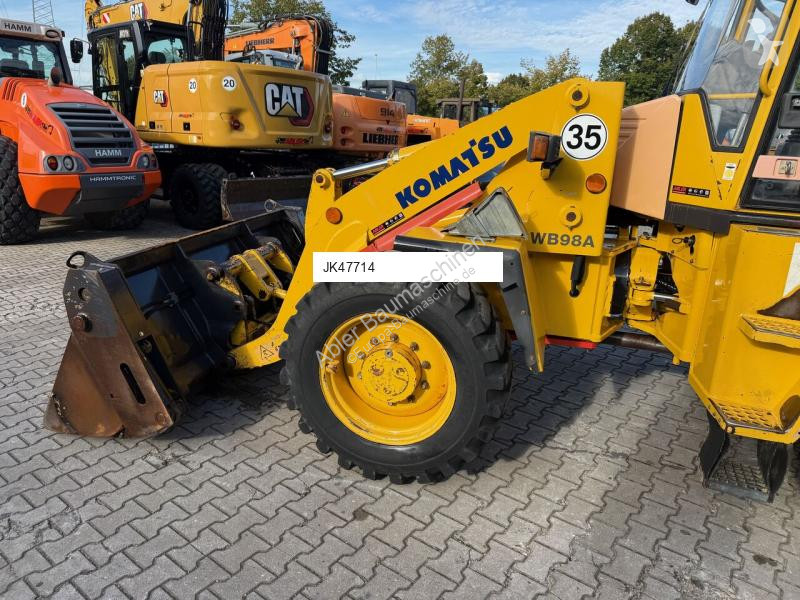 Traktor med grab Komatsu
