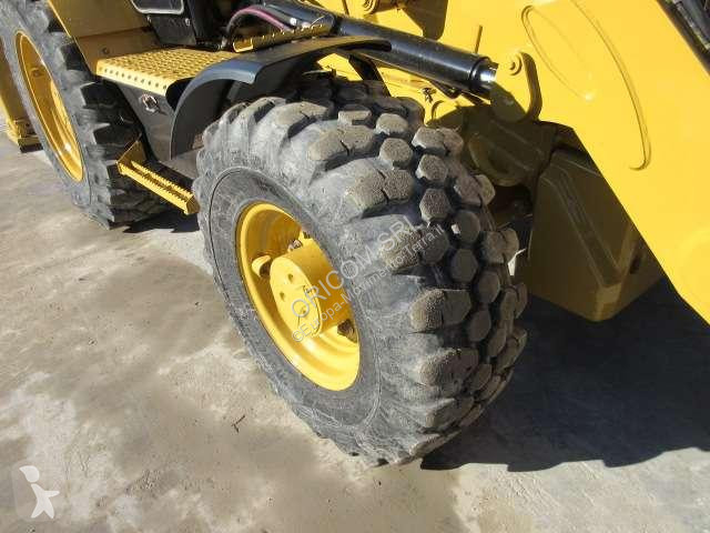 Traktor med grab Caterpillar 432