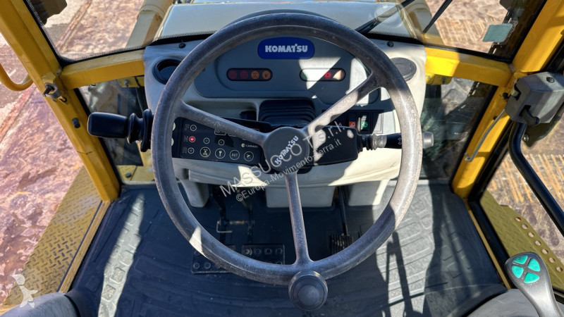 Traktor med grab Komatsu