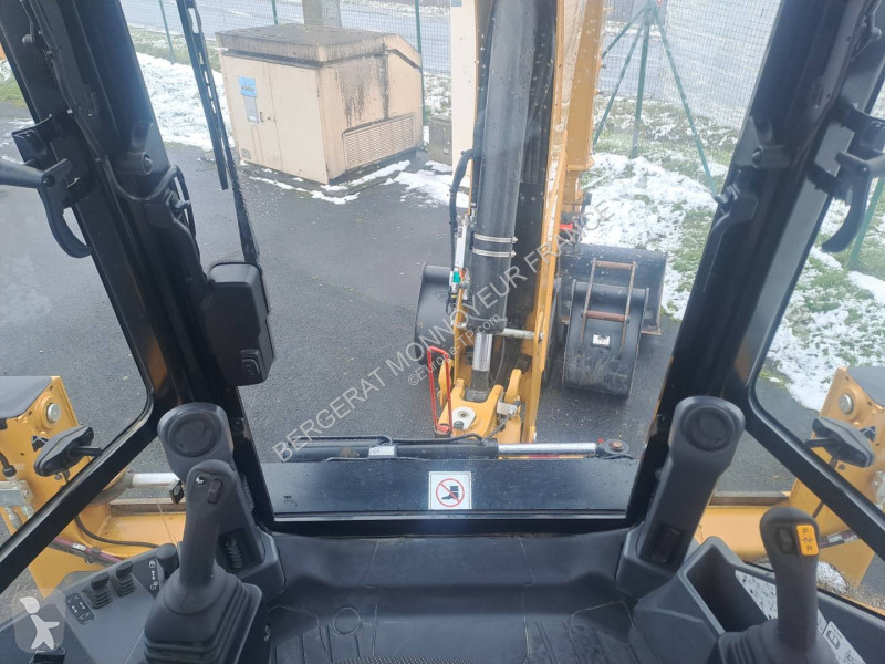 Rýpadlo-nakladač Caterpillar 432