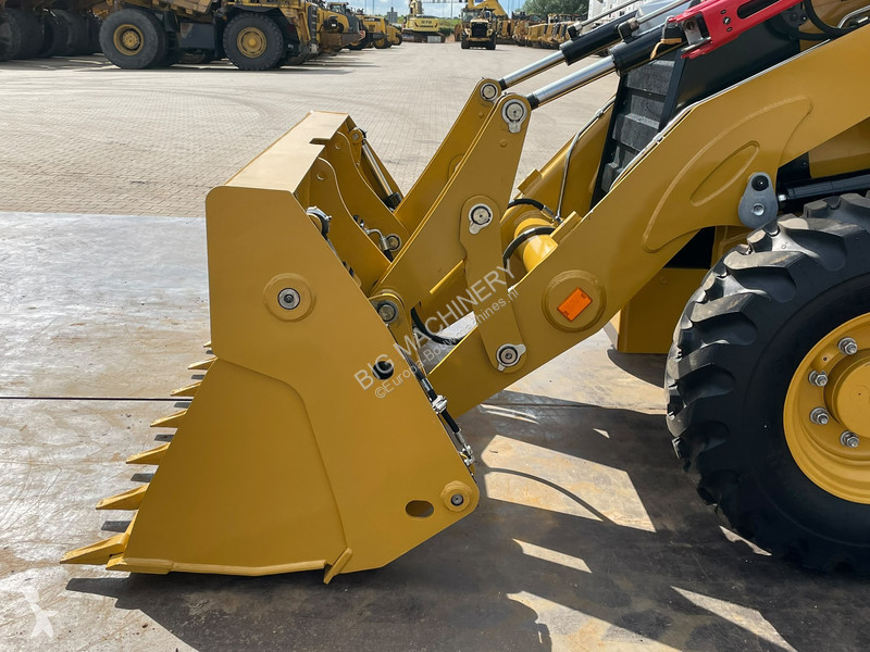 Rýpadlo-nakladač Caterpillar 424