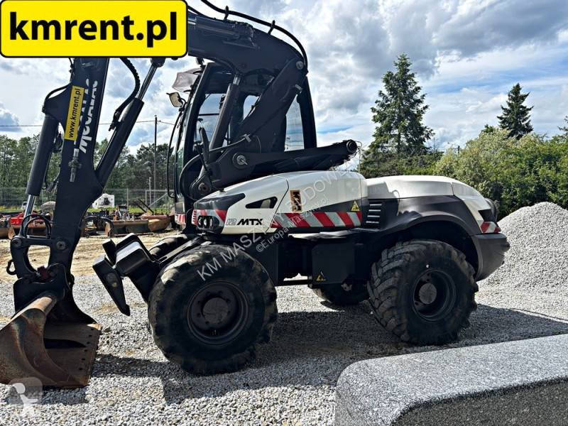 Koparko-ładowarka Mecalac 12 MTX...