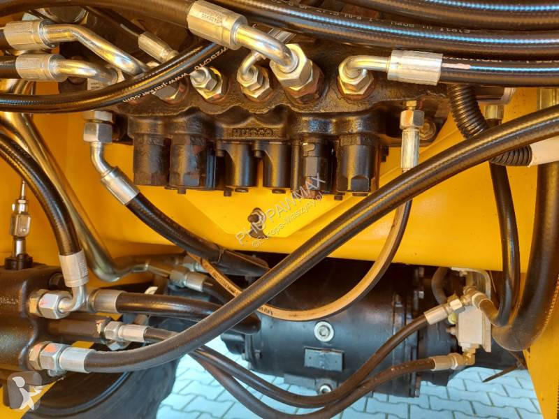 Traktor med grab JCB