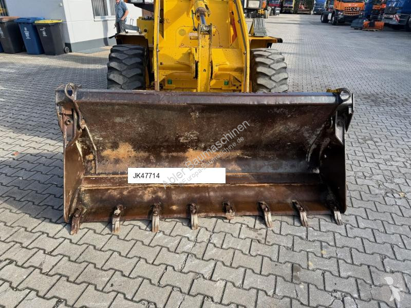 Traktor med grab Komatsu